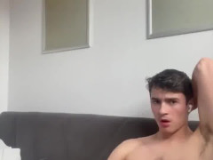 hairy cock stud watches porn and shoots creamy cum